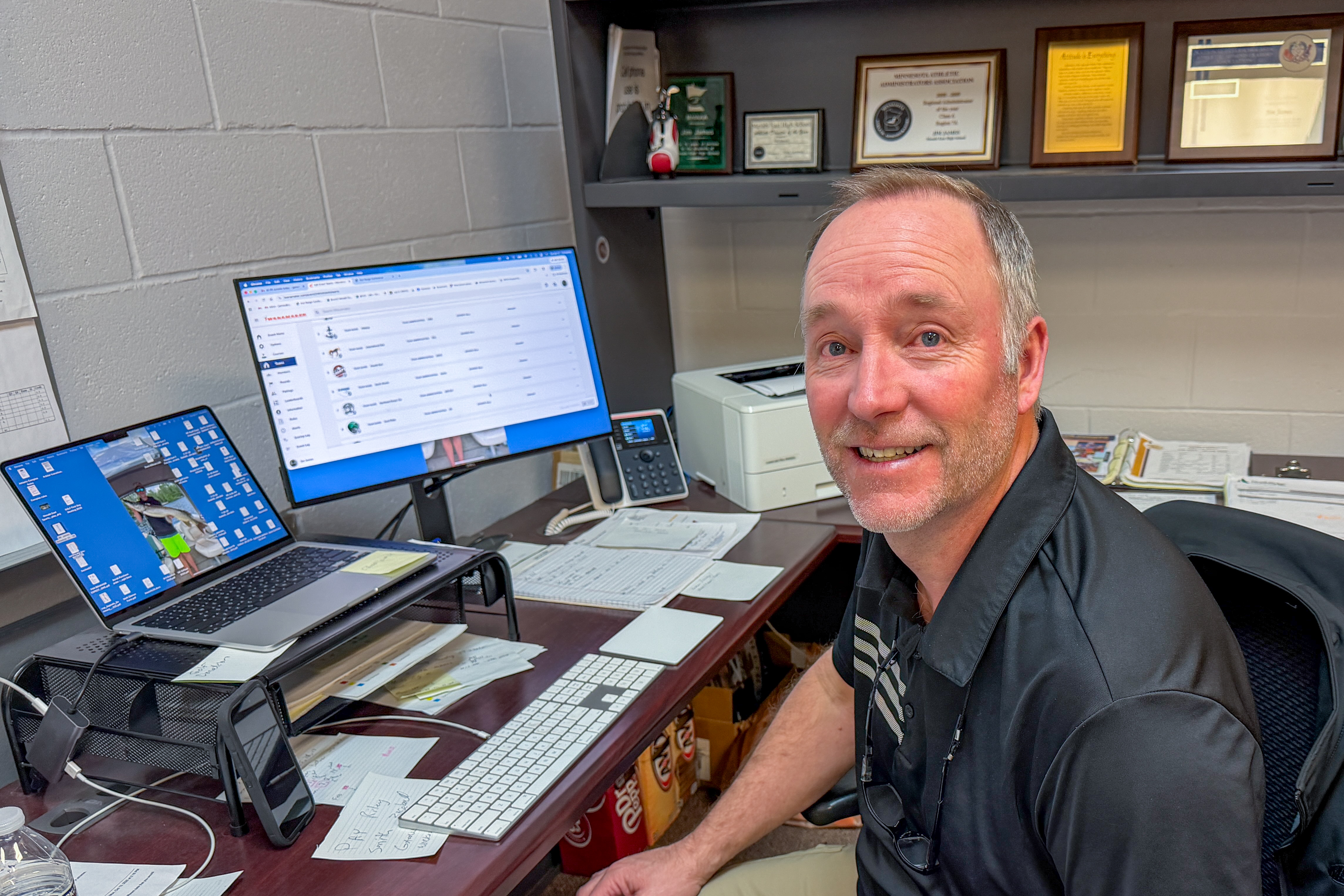 Mr. James working in his office as Mesabi East Athletic Director